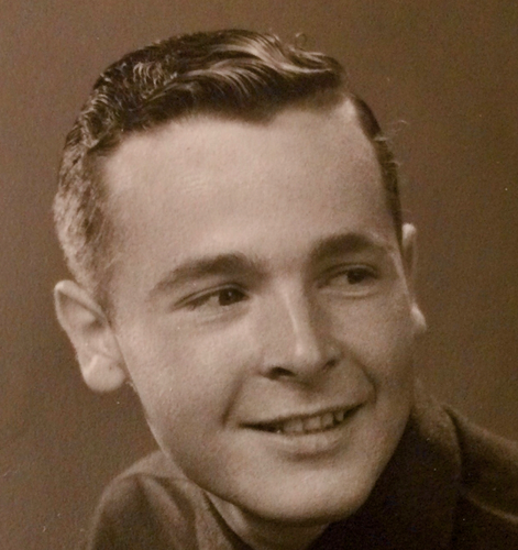 Current black and white portrait photo of Anton Aebischer from 1951. The young man in the portrait is smiling and looking to the side.